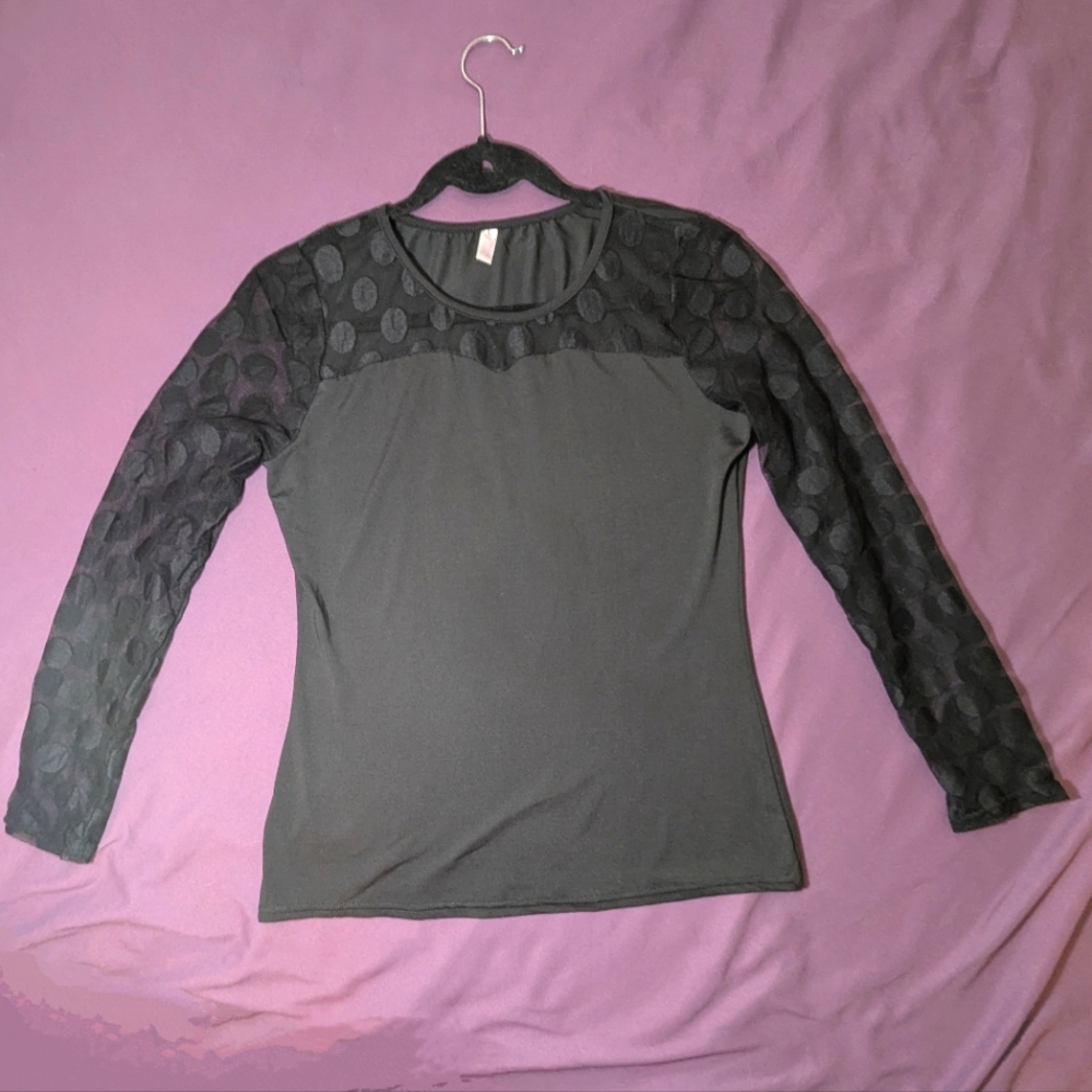Chic Black Long Sleeve Top with Sheer Polka Dot Accents